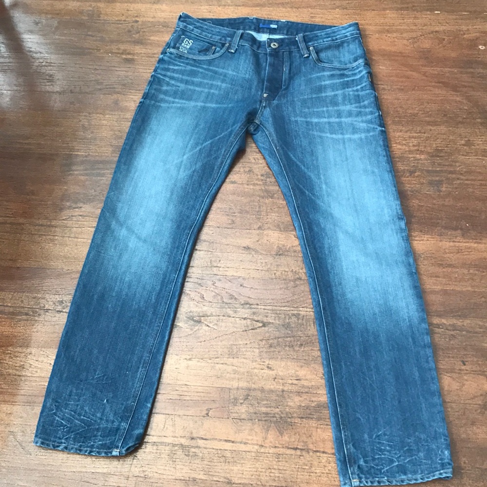 Like new men’s jeans.  Rarely worn